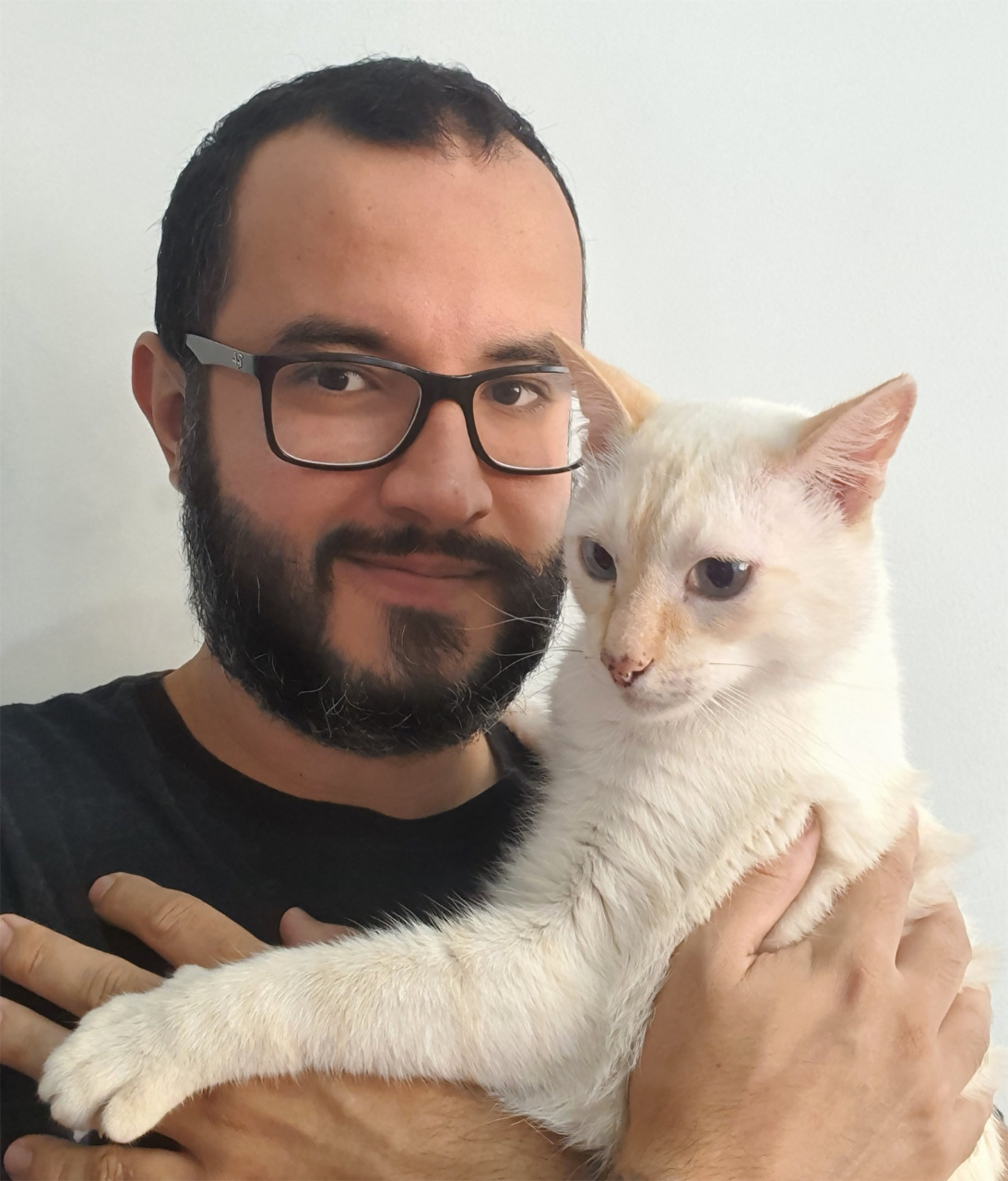 Thiago e seu gato Champanhe